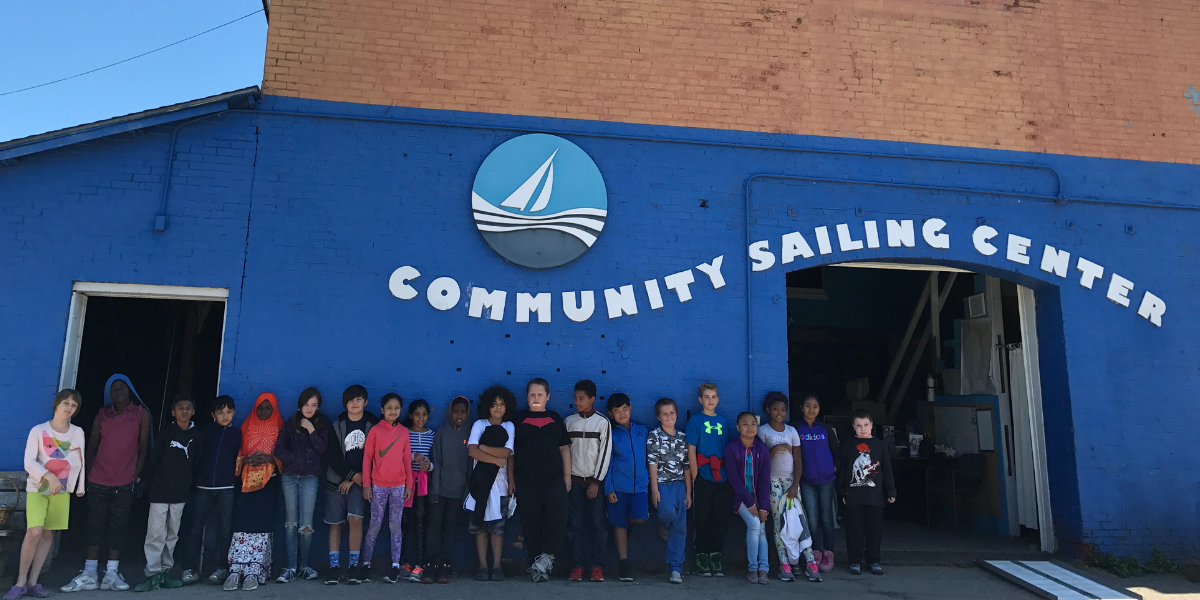Group of children in front of the Community Sailing Center